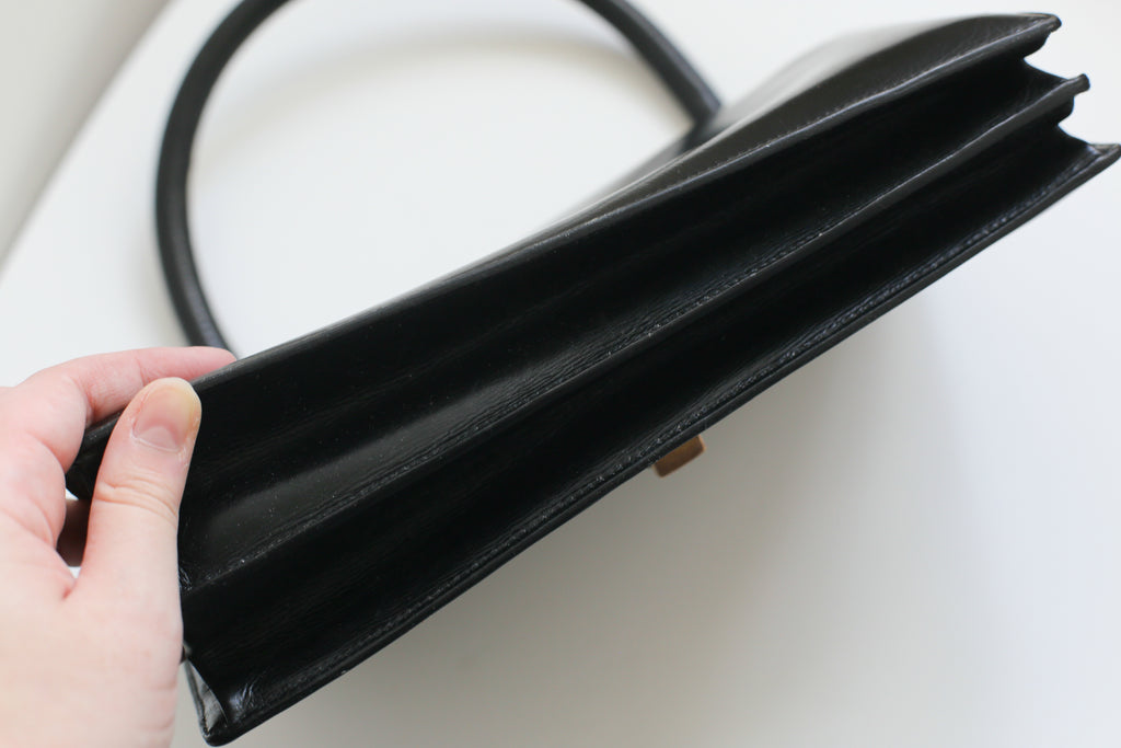 Hermès sac à main modèle ring en box noir