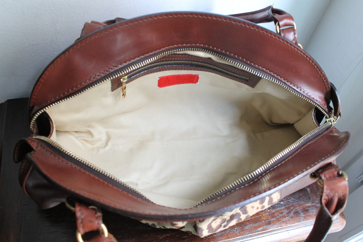 Valentino Garavani sac à main modèle bowling en cuir et fourrure à motif léopard