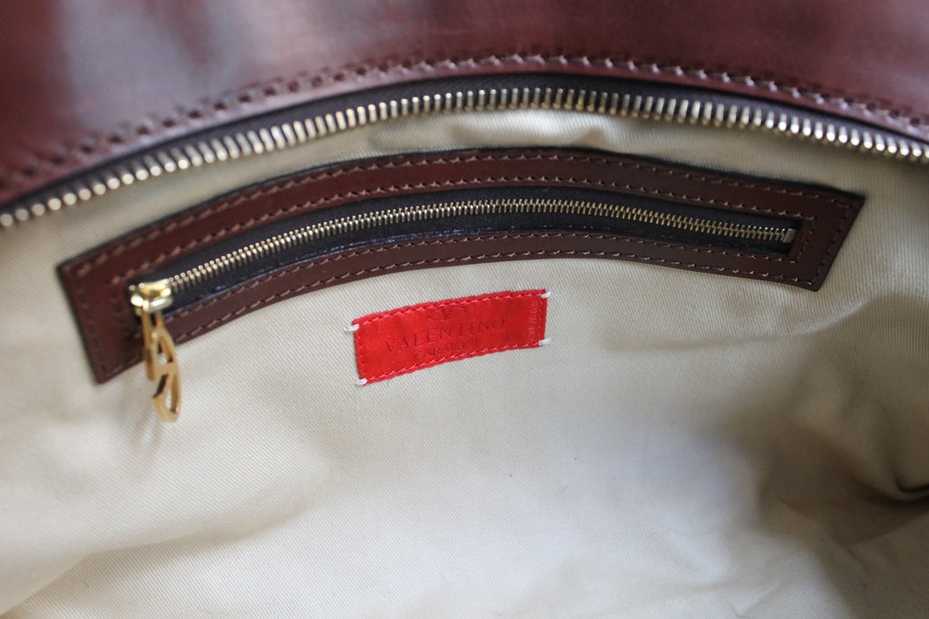 Valentino Garavani sac à main modèle bowling en cuir et fourrure à motif léopard