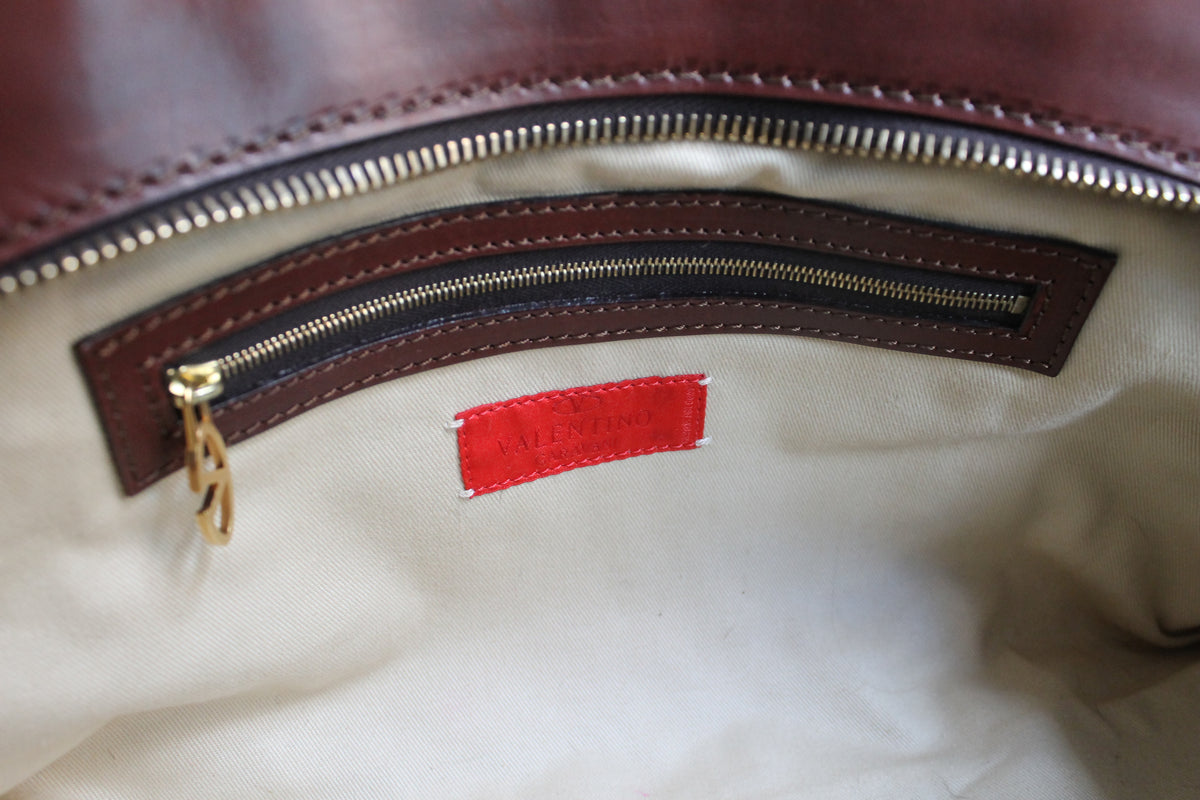Valentino Garavani sac à main modèle bowling en cuir et fourrure à motif léopard