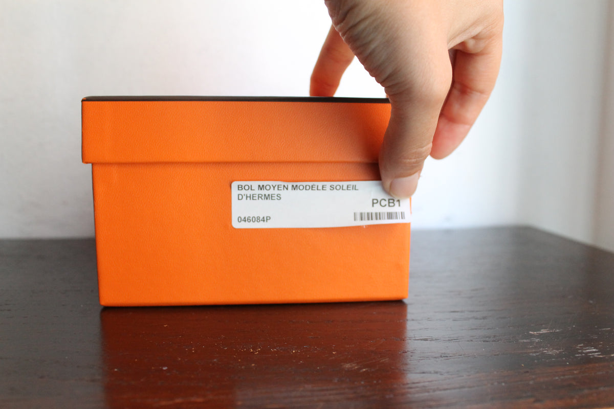 Hermès bol moyen en porcelaine modèle "Soleil d'Hermès" jaune et blanc neuf