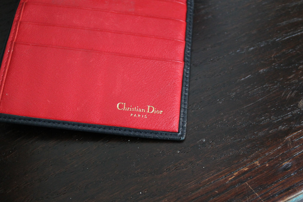 Dior portefeuille modèle 30 Montaigne en cuir bleu marine