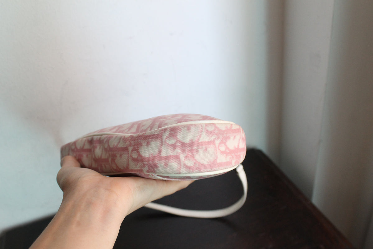 Dior sac à main modèle saddle rose en toile et cuir