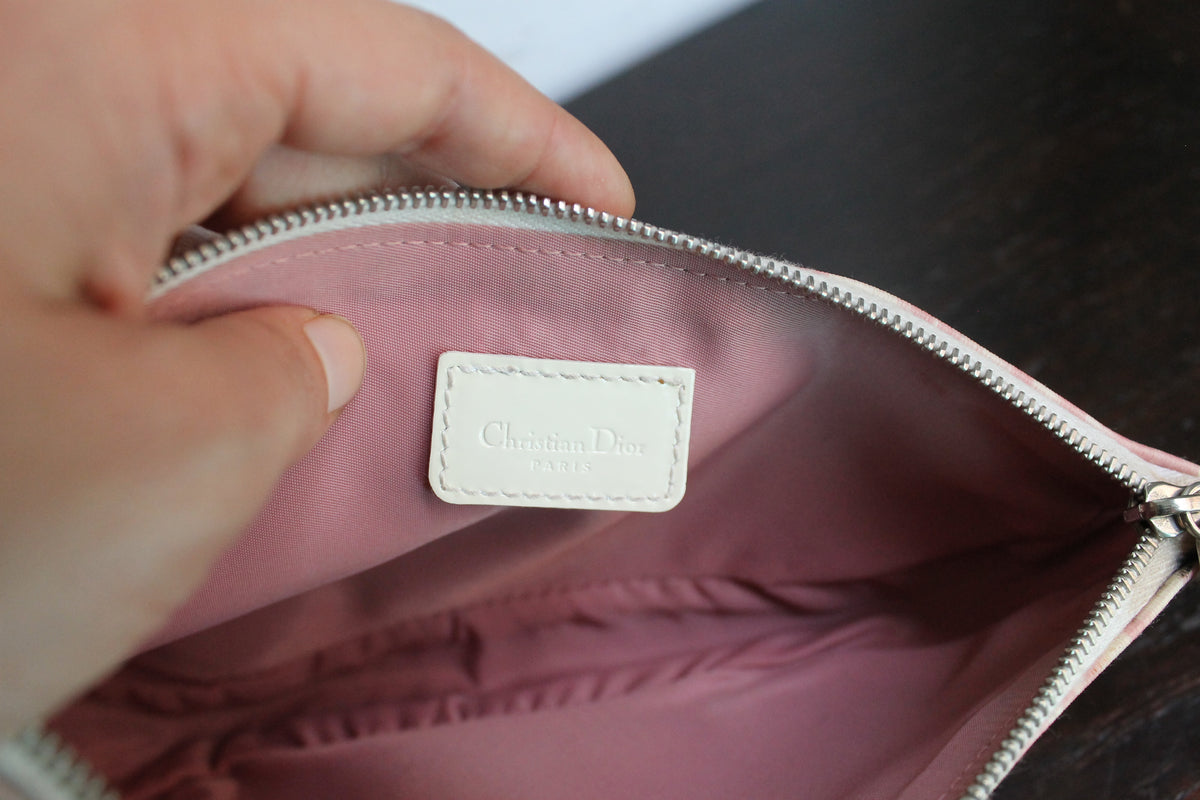Dior sac à main modèle saddle rose en toile et cuir