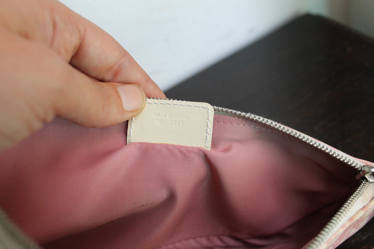 Dior sac à main modèle saddle rose en toile et cuir
