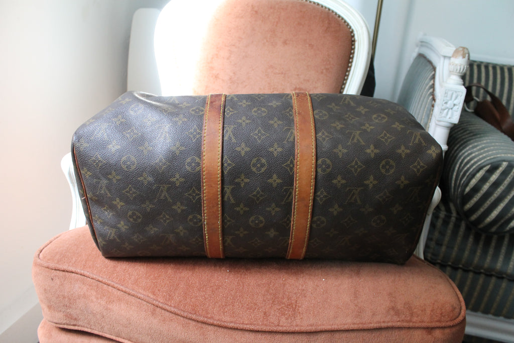 Louis Vuitton sac de voyage Keepall 45 en toile monogram et cuir