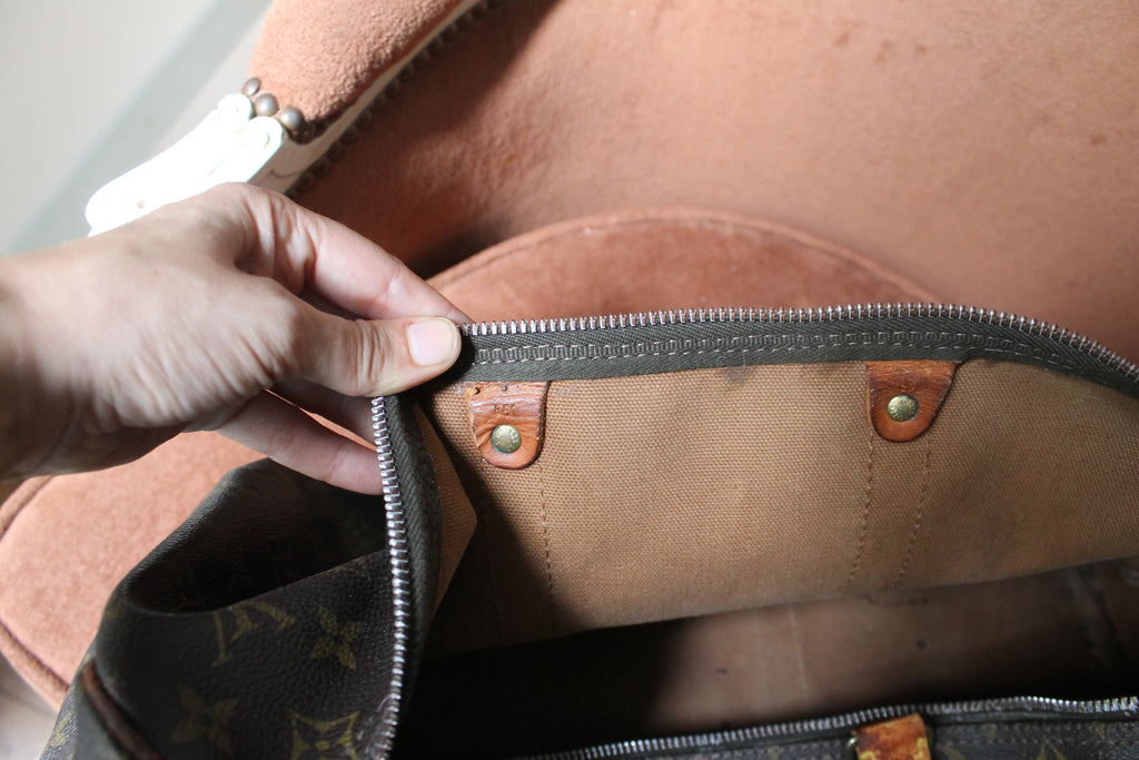 Louis Vuitton sac de voyage Keepall 45 en toile monogram et cuir