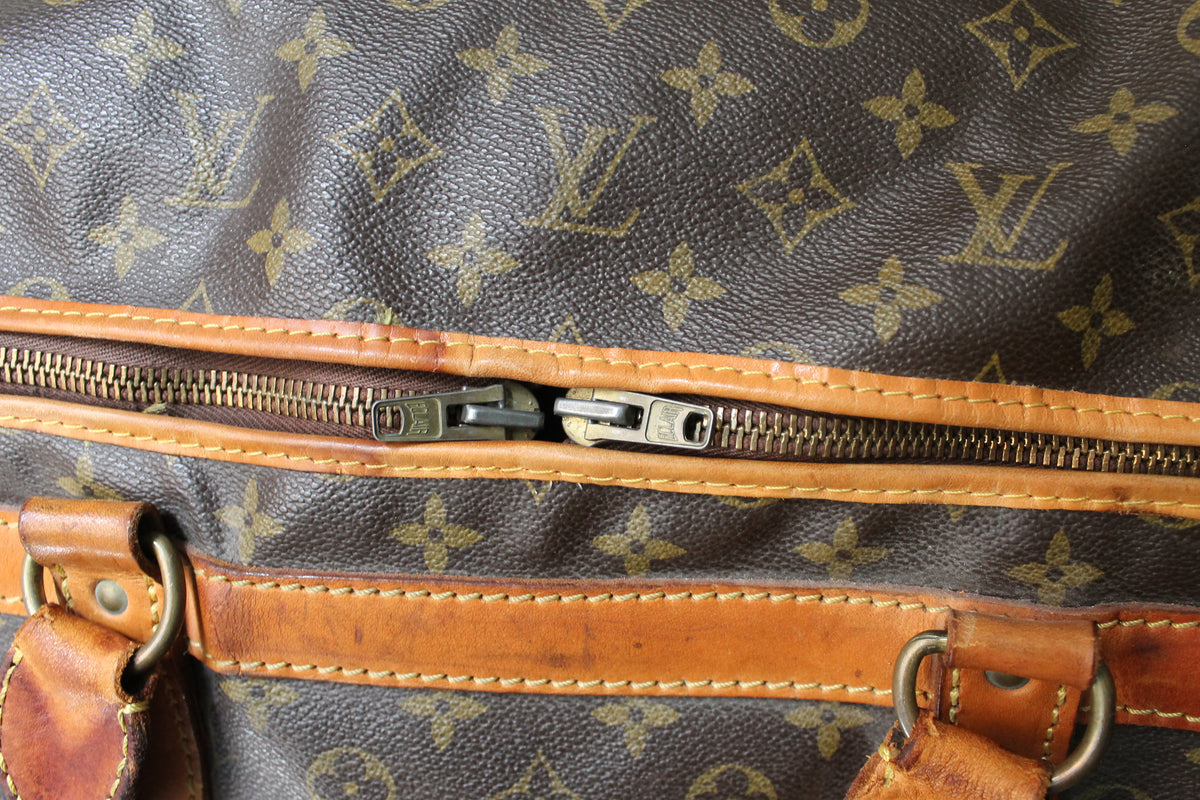 Louis Vuitton sac de voyage vintage en toile monogram et cuir camel