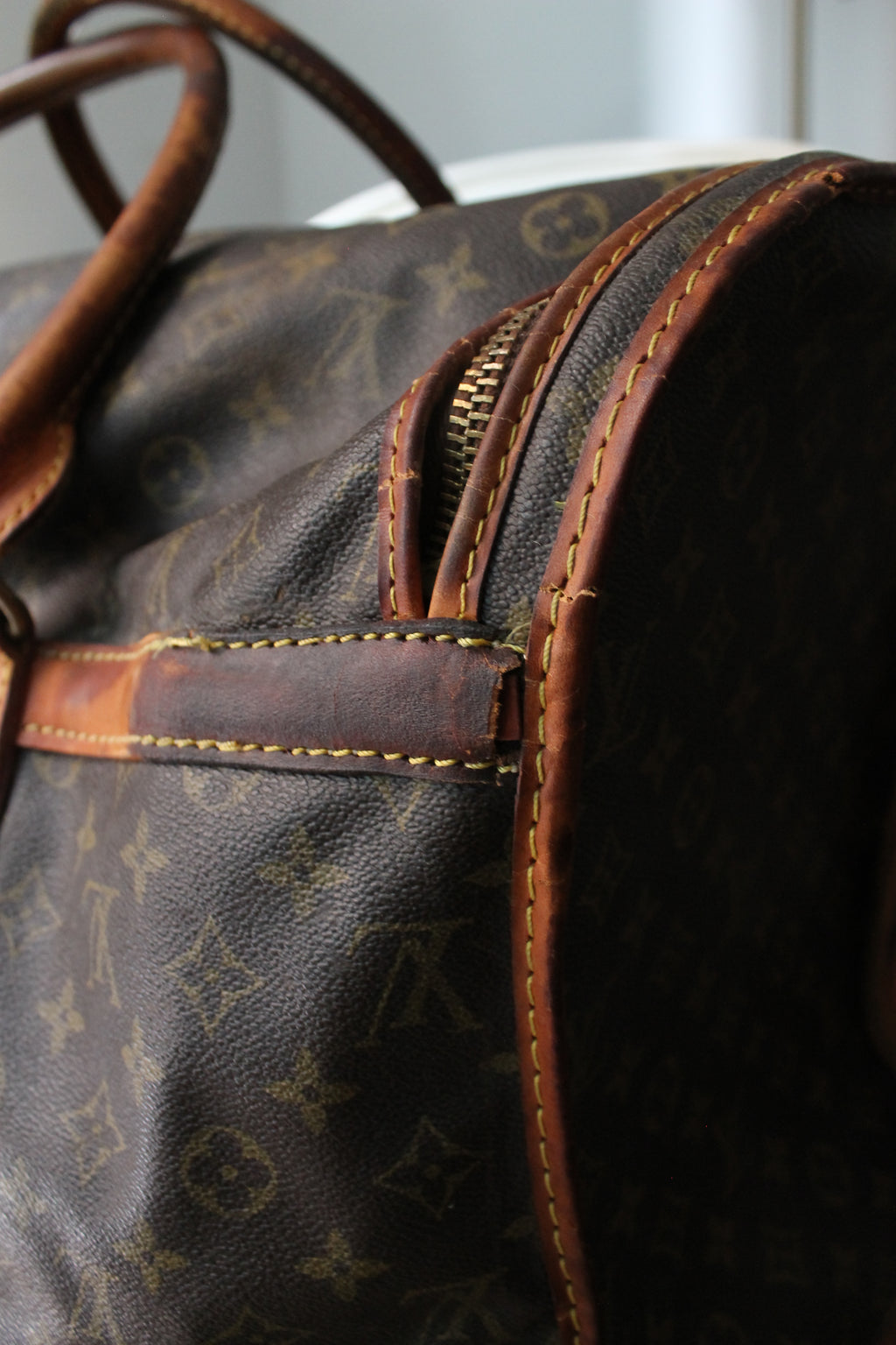 Louis Vuitton sac de voyage vintage en toile monogram et cuir camel