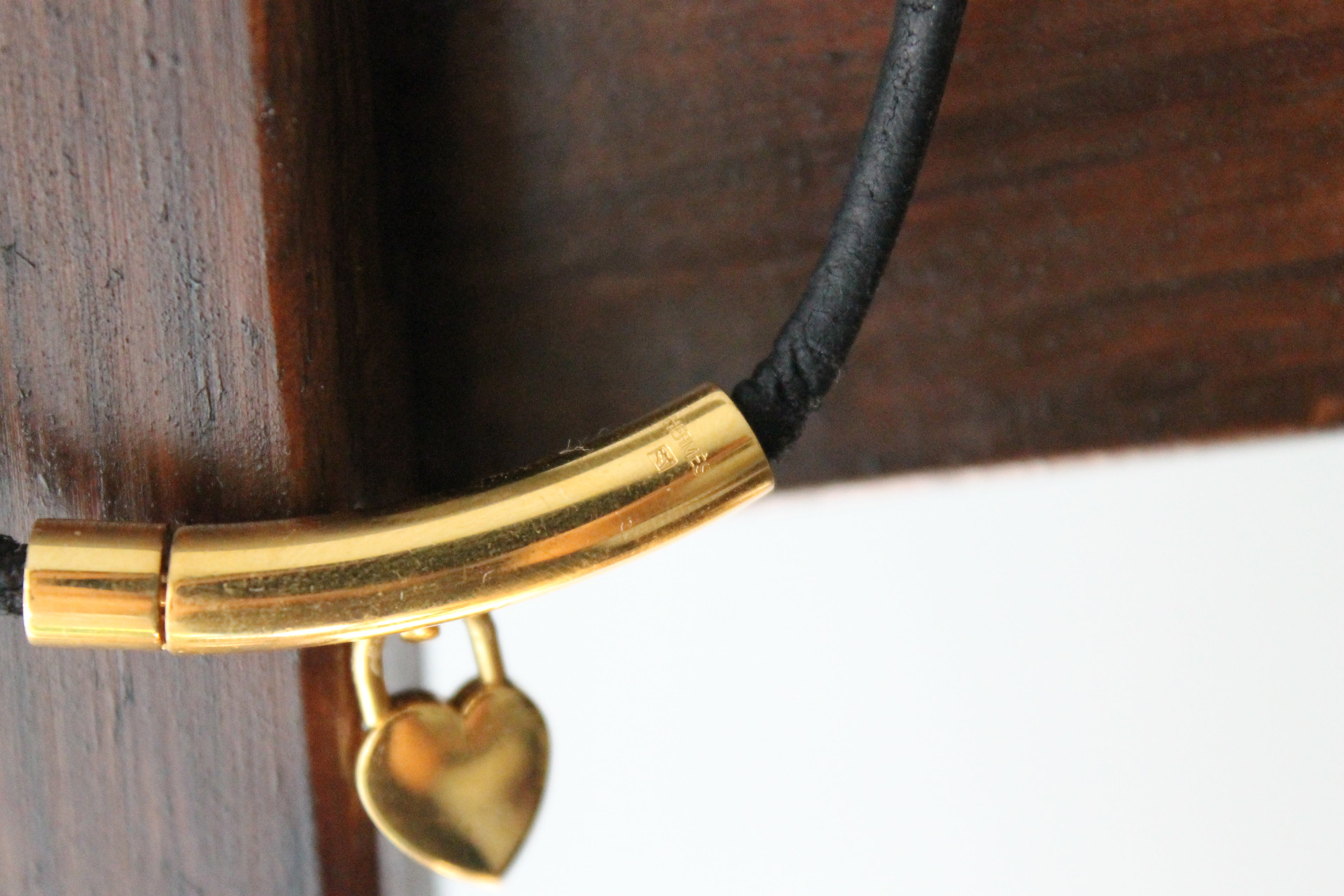 Hermès collier à breloque coeur cadenas plaqué or
