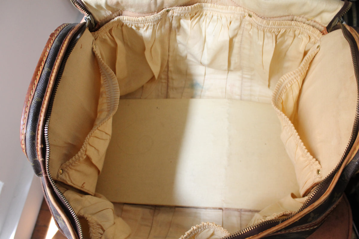 Louis Vuitton sac de voyage vintage en toile monogram et cuir camel