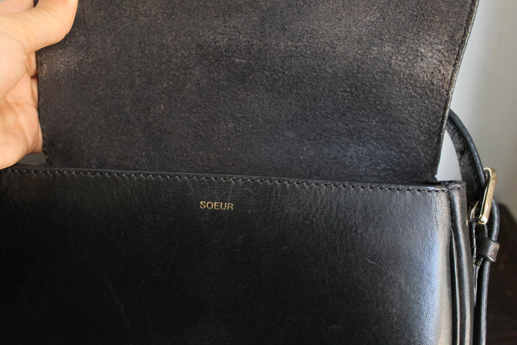 Soeur sac à main en cuir noir