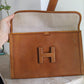 Hermès pochette modèle Jige en cuir gold grainé