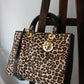 Dior sac à main Lady Dior en cuir verni et fausse fourrure léopard