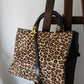 Dior sac à main Lady Dior en cuir verni et fausse fourrure léopard
