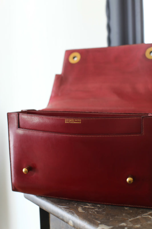 Sac à main Hermès en cuir rouge modèle Piano