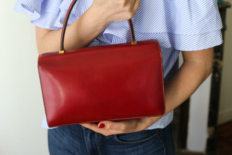 Sac à main Hermès en cuir rouge modèle Piano