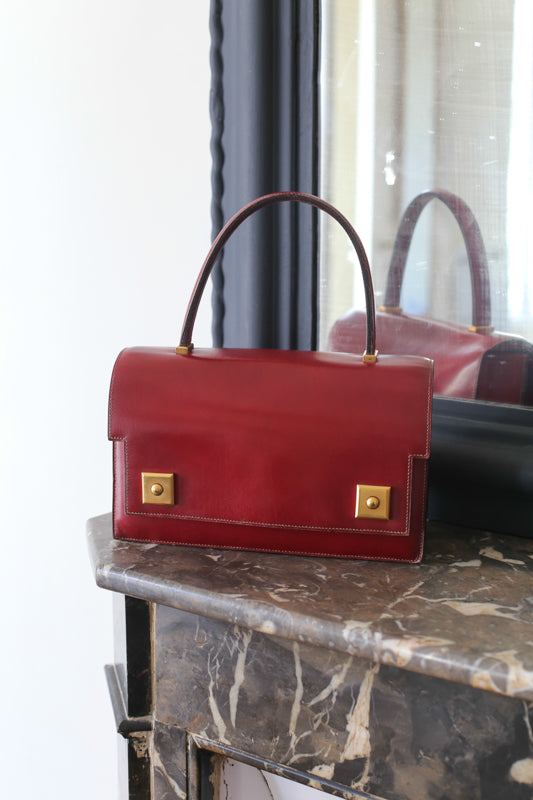 Sac à main Hermès en cuir rouge modèle Piano