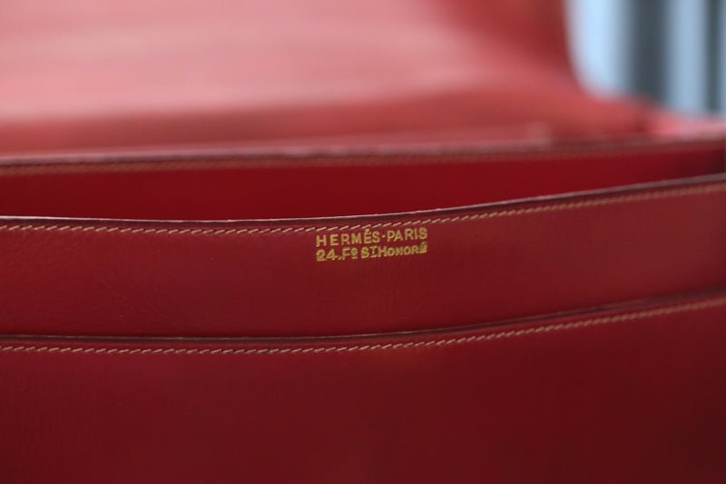 Sac à main Hermès en cuir rouge modèle Piano