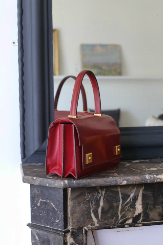 Sac à main Hermès en cuir rouge modèle Piano