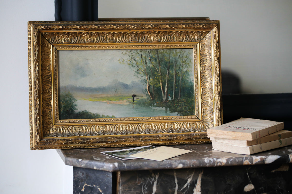 L.Henry Peinture sur panneau "Un homme solitaire contemplatif dans un paysage lacustre"