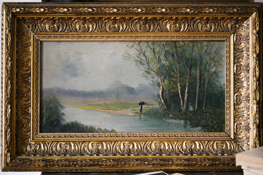 L.Henry Peinture sur panneau "Un homme solitaire contemplatif dans un paysage lacustre"