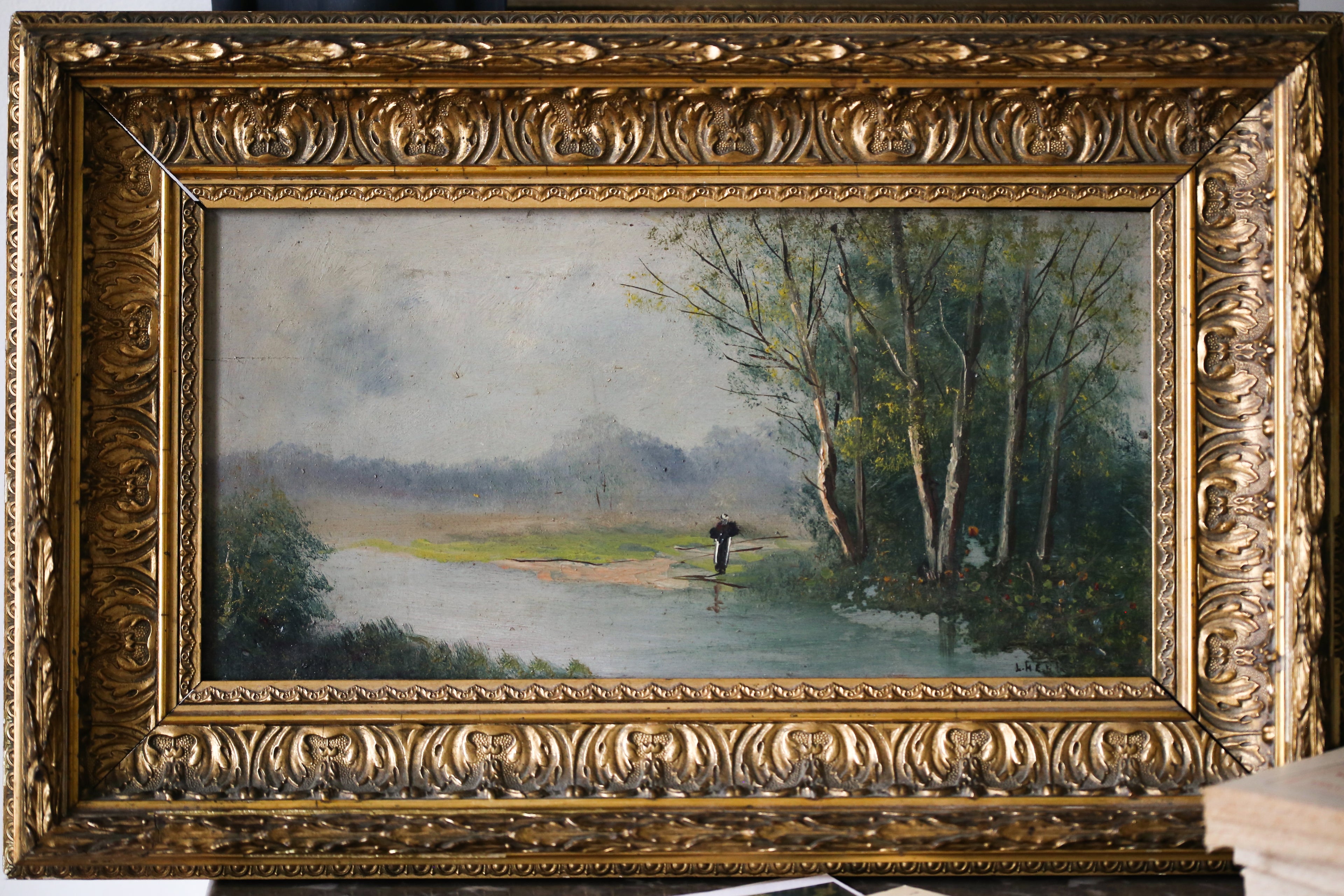 L.Henry Peinture sur panneau "Un homme solitaire contemplatif dans un paysage lacustre"