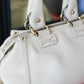 Céline sac à main couleur crème en cuir motif triomphe