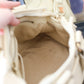 Céline sac à main couleur crème en cuir motif triomphe