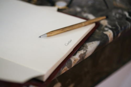 Vintage Cartier photo album in burgundy leather